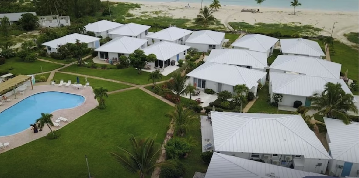 Aerial of Ocean Villas with pool and beach